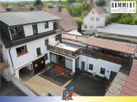 Hauptbild Vielseitiges Dreifamilienhaus mit großem Garten - bezugsfrei